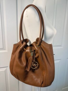 Michael Kors Brown Pebbled Leather Drawstring Tassel Shoulder Bag